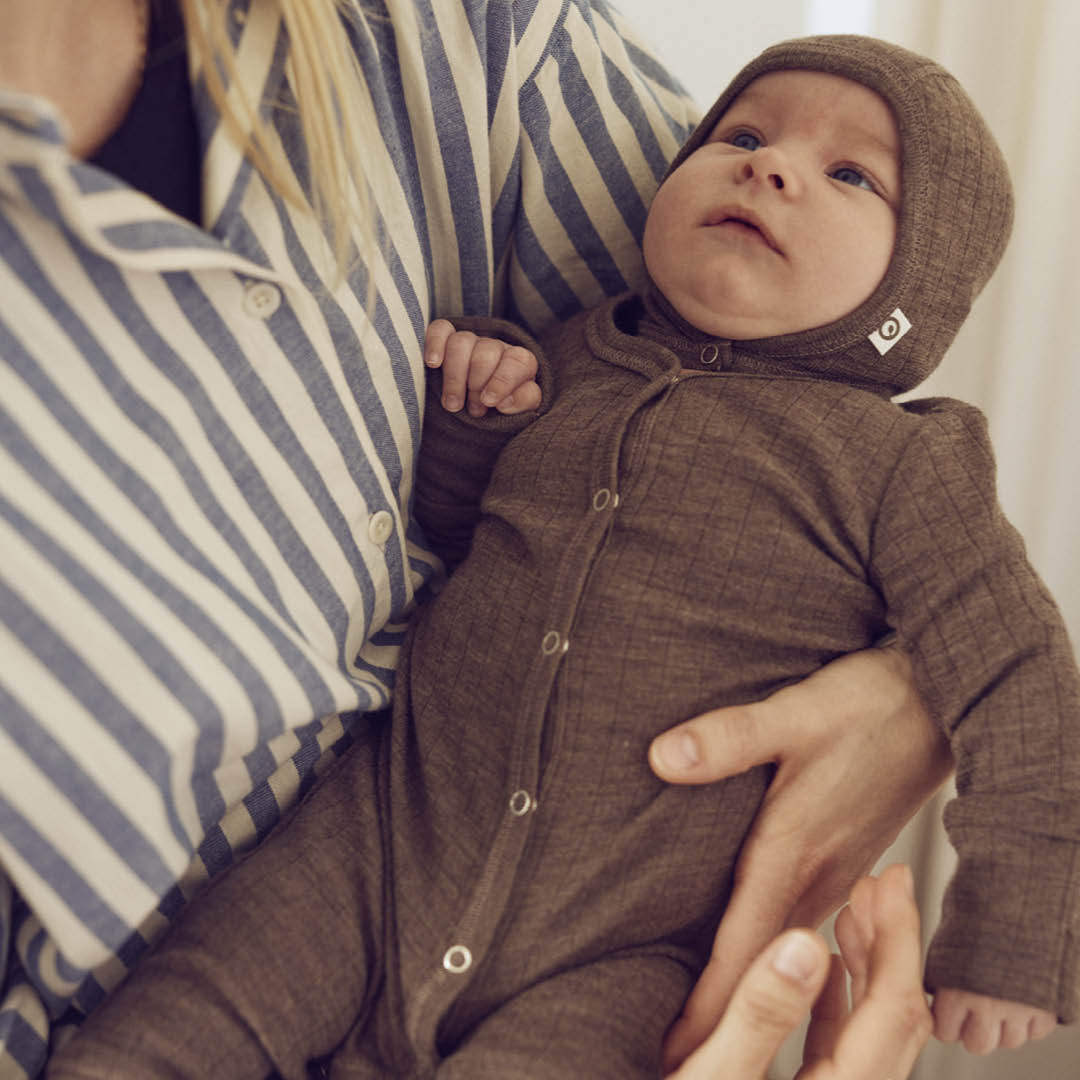 müsli WOOLLY RIB bodysuit with feet Bodystockings Walnut melange 821000012